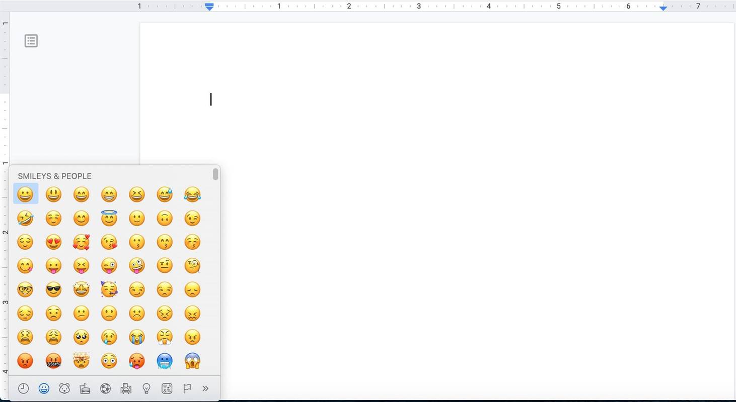 Binubuksan ang emoji keyboard sa Mac.