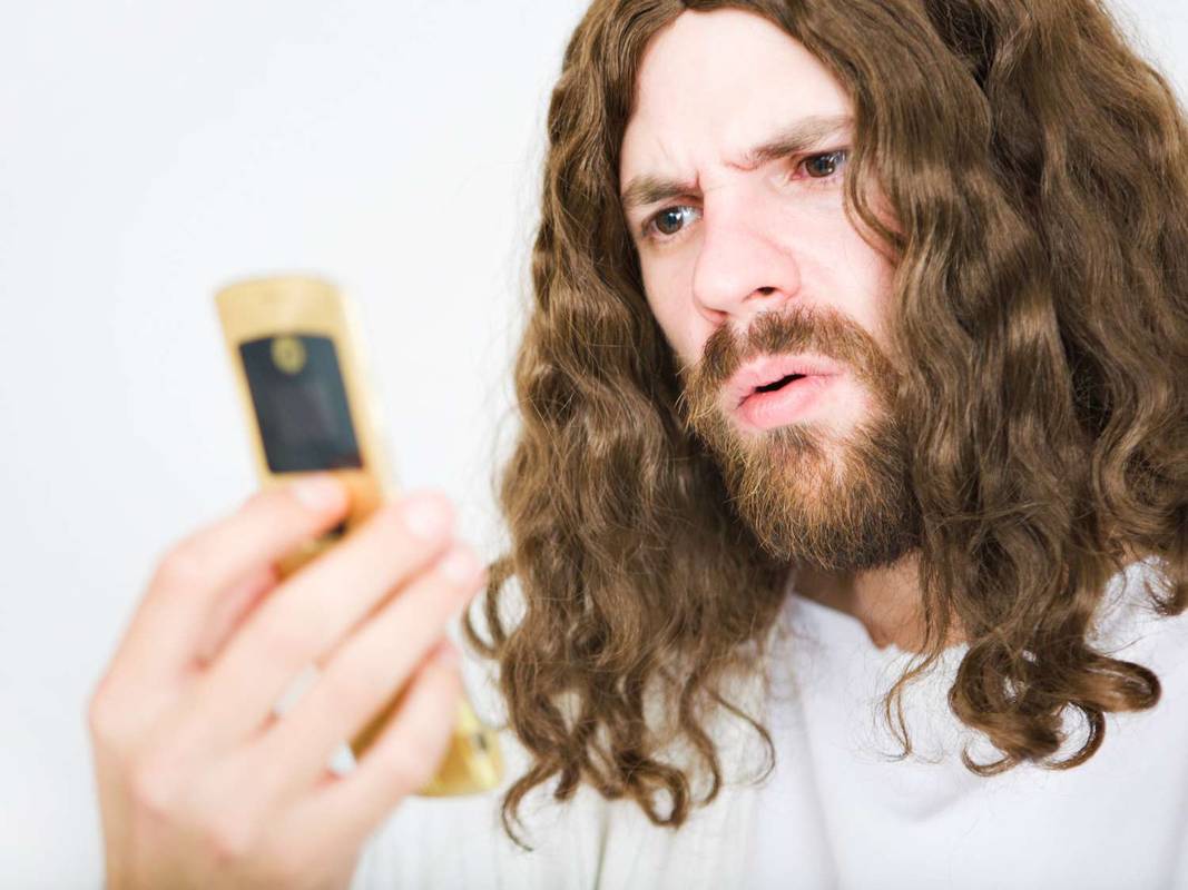 Jezus gebruikt een klaptelefoon